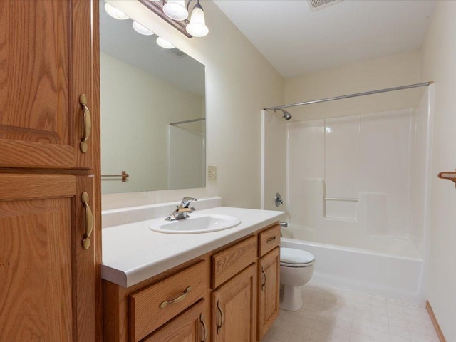 full bathroom with shower / bath combination, vanity, tile floors, and toilet