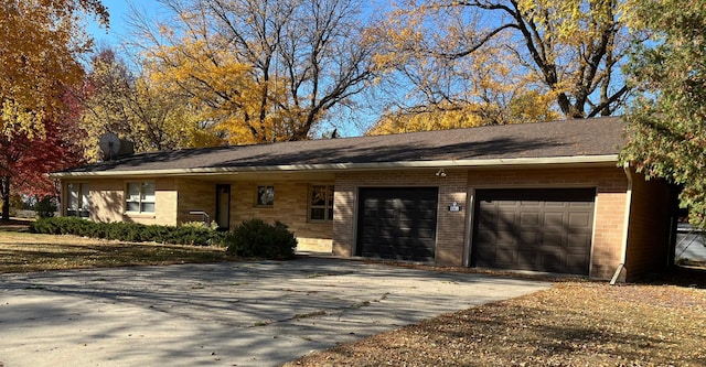 ranch-style home with a garage