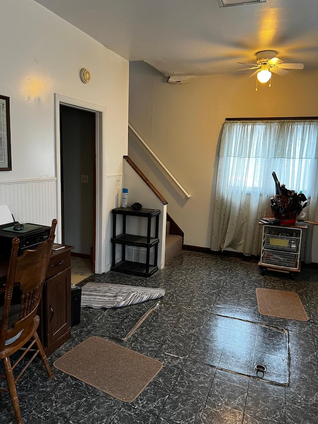 living room featuring ceiling fan