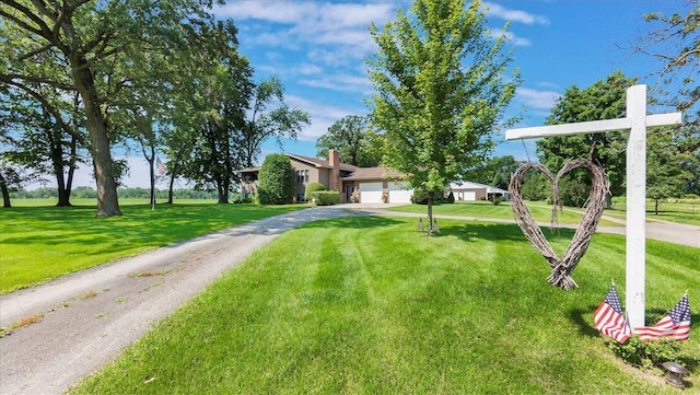 view of yard featuring a garage