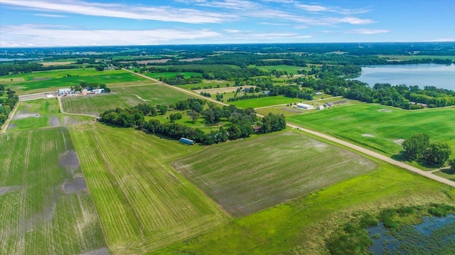 drone / aerial view with a water view and a rural view