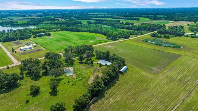 birds eye view of property with a rural view and a water view