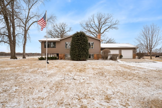 view of property exterior with a garage