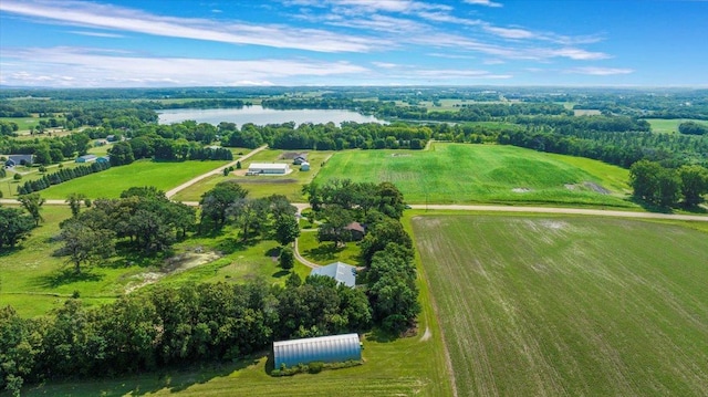 drone / aerial view with a water view and a rural view