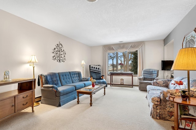 living room featuring light carpet and a textured ceiling