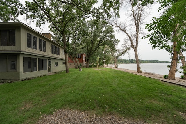 view of yard with a water view