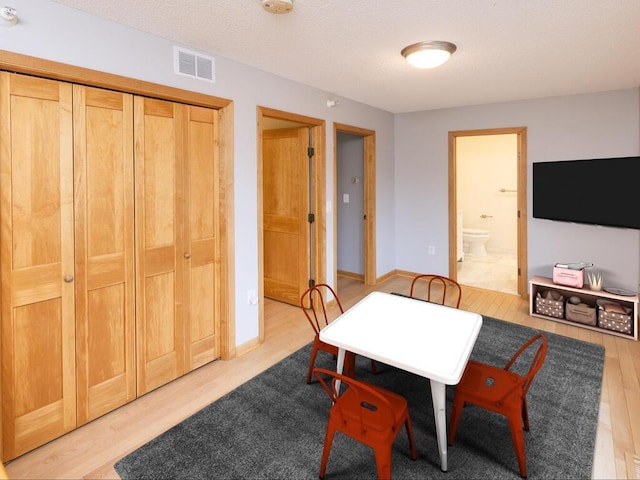 dining room featuring light hardwood / wood-style flooring