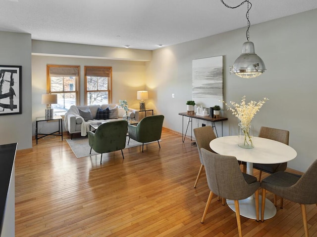 dining room with light hardwood / wood-style floors