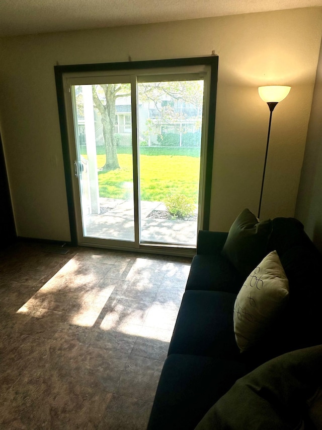 entryway with a textured ceiling