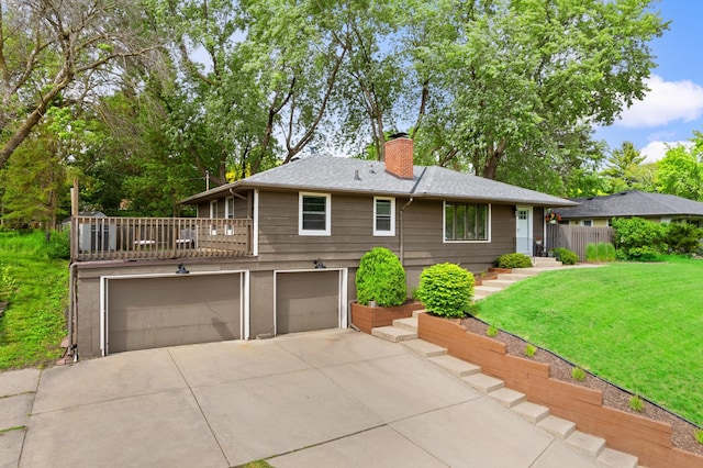 3706 90th St, Bloomington, MN 55431 - view of front facade featuring concrete driveway, an attached garage, a chimney, and a front lawn