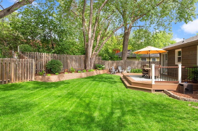 3706 90th St, Bloomington, MN 55431 - fenced backyard with a wooden deck and outdoor dining area