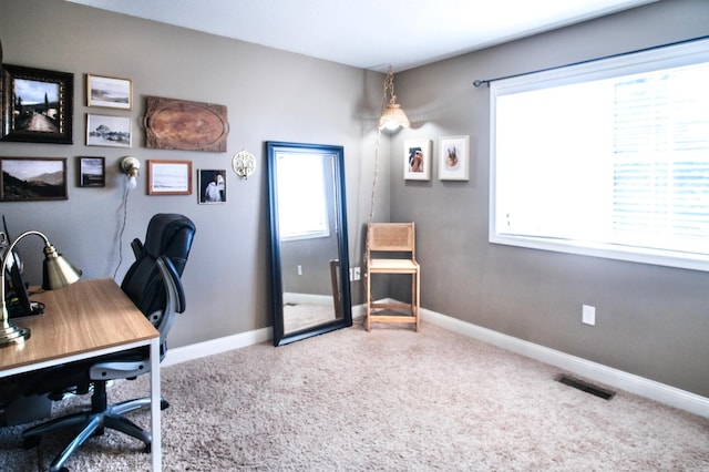 view of carpeted home office