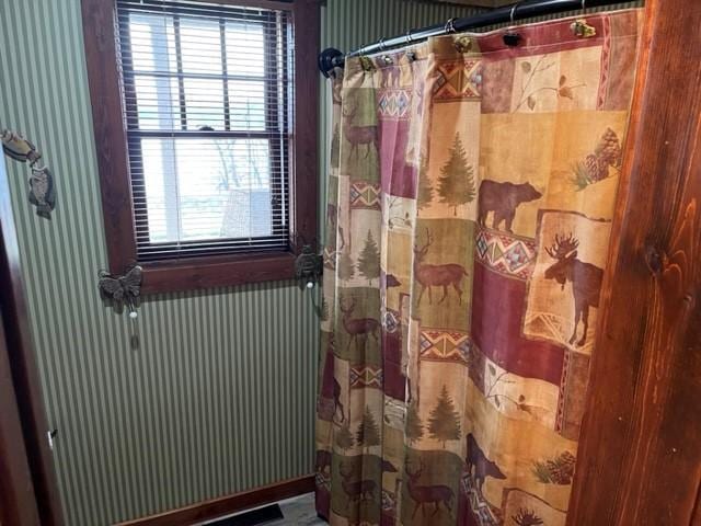 bathroom featuring a shower with curtain