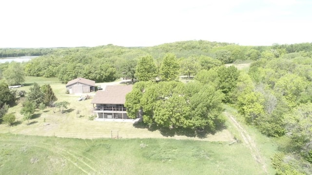 birds eye view of property with a rural view