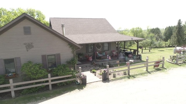 exterior space with a lawn and a patio