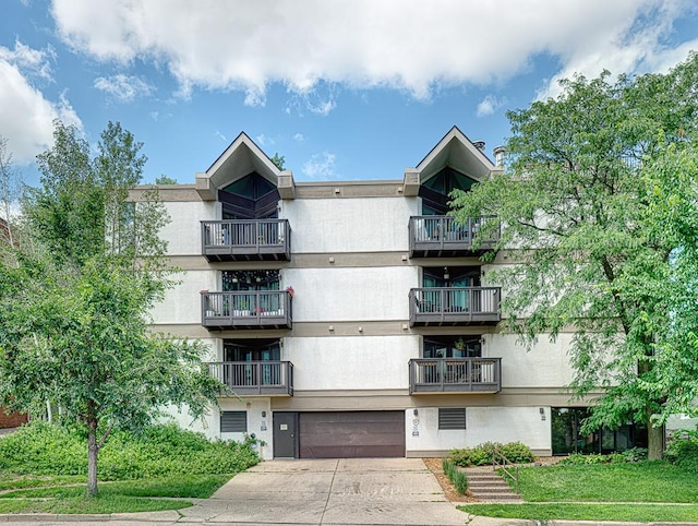 view of building exterior featuring a garage