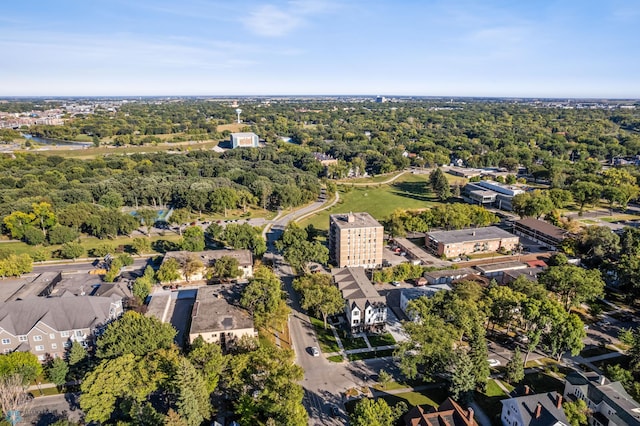aerial view featuring a wooded view