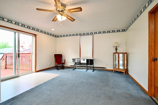 unfurnished room with a textured ceiling, carpet flooring, ceiling fan, and a baseboard heating unit