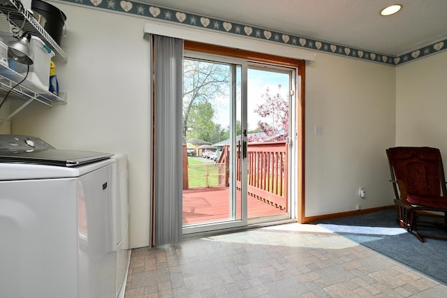 laundry area with washing machine and clothes dryer