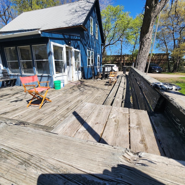 deck featuring a sunroom