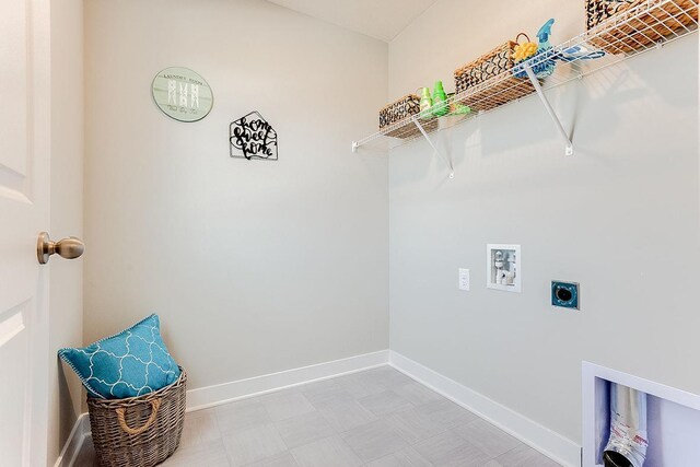 clothes washing area with hookup for an electric dryer and washer hookup