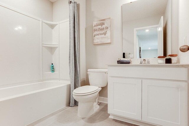 full bathroom with toilet, shower / bath combo with shower curtain, vanity, and tile patterned floors