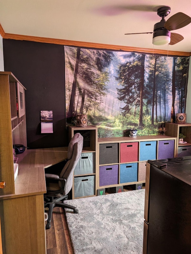 home office featuring ceiling fan and wood-type flooring