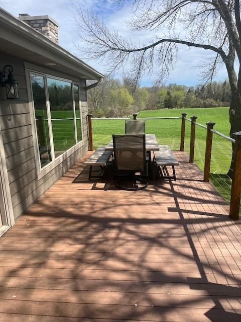 deck featuring a yard
