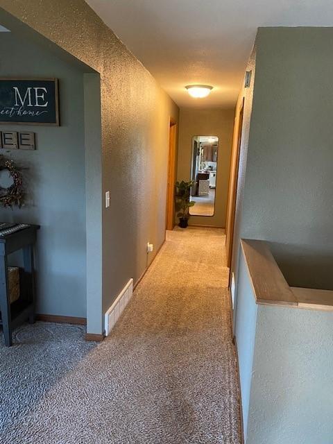 corridor with carpet