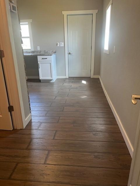 hall featuring dark hardwood / wood-style floors