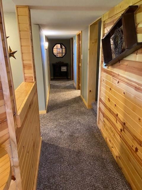 corridor featuring carpet flooring