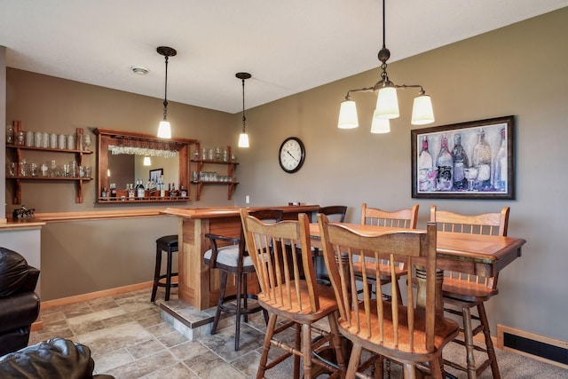 dining space with bar area