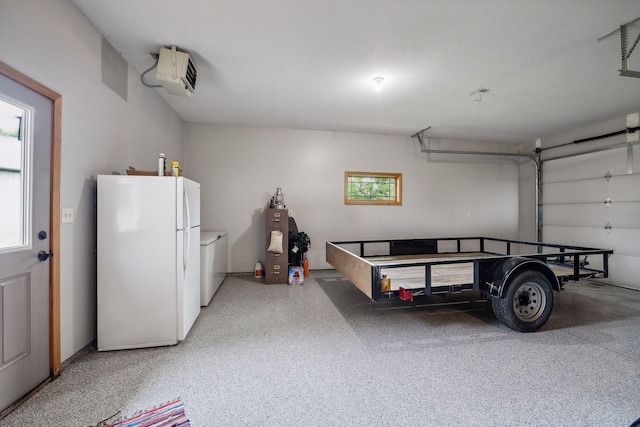 garage with white refrigerator