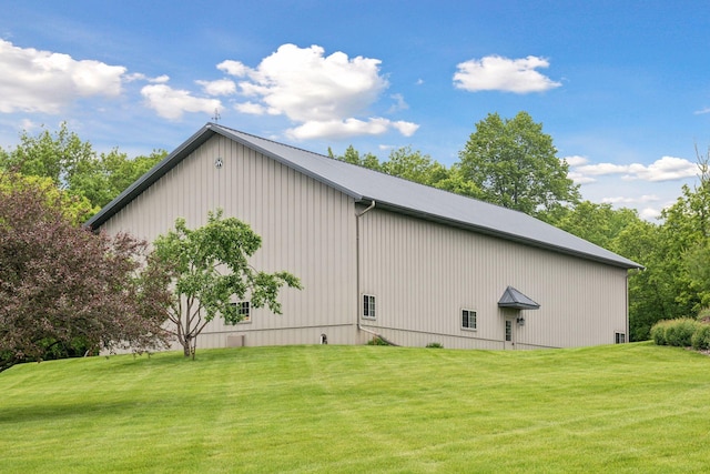 view of home's exterior featuring a yard