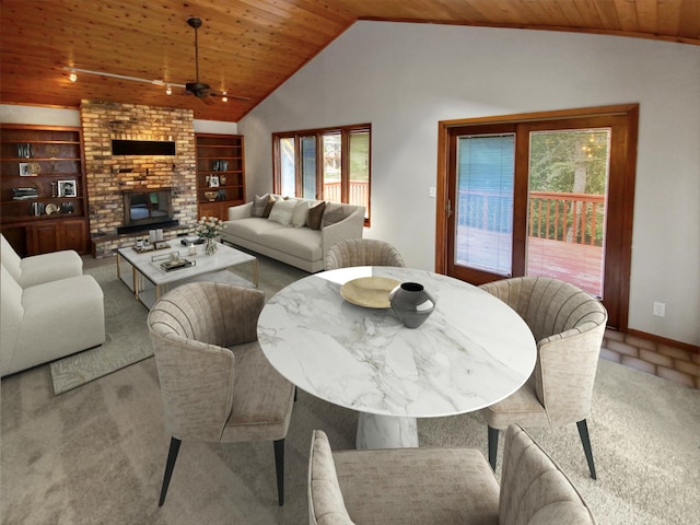 carpeted dining space featuring built in shelves, vaulted ceiling, and wooden ceiling