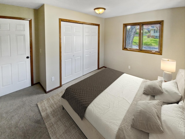 bedroom with light colored carpet and a closet