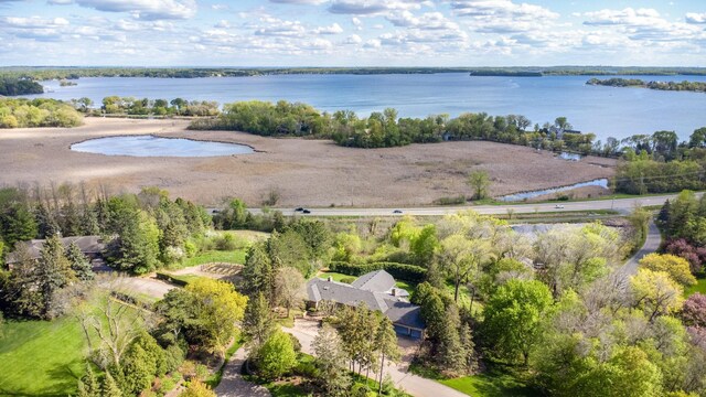 bird's eye view with a water view