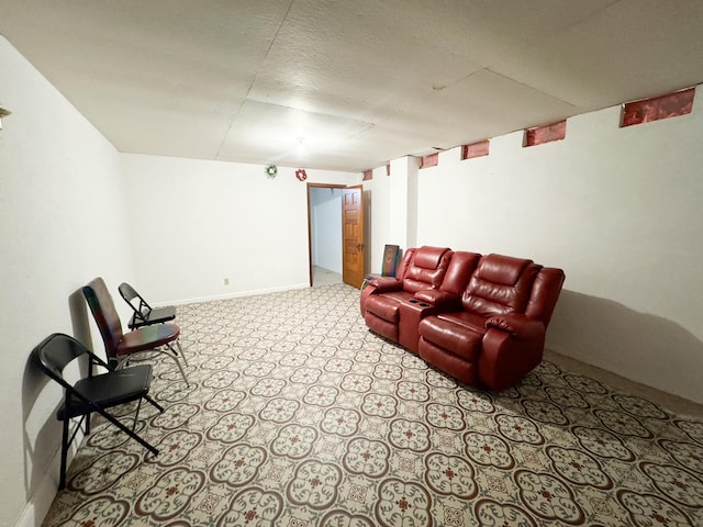 living room featuring a textured ceiling