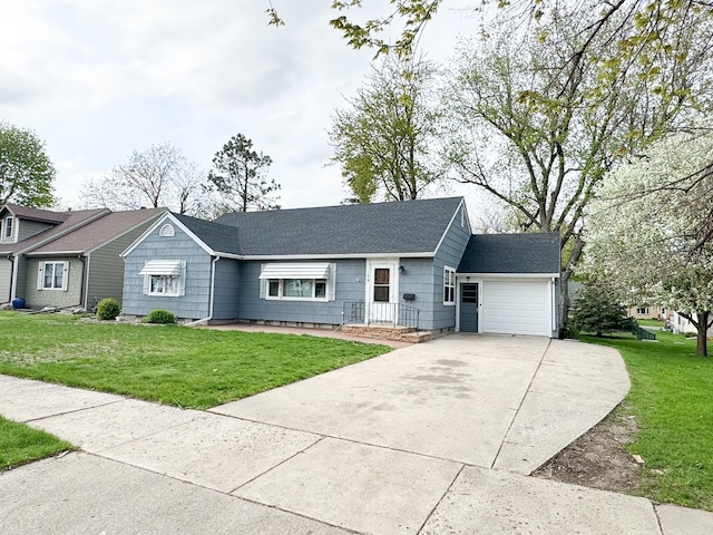 ranch-style house with a garage and a front yard