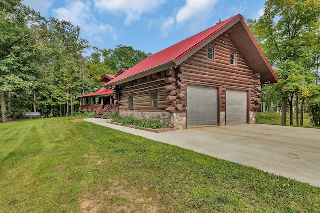 view of property exterior featuring a lawn