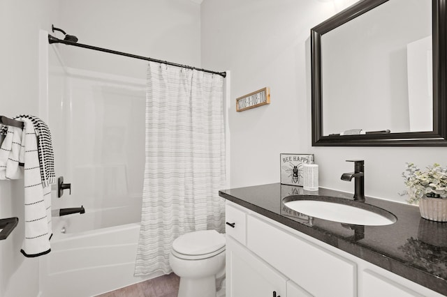 full bathroom featuring shower / tub combo with curtain, hardwood / wood-style floors, vanity, and toilet