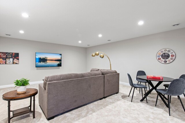 living room with light carpet