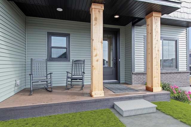 doorway to property with a porch