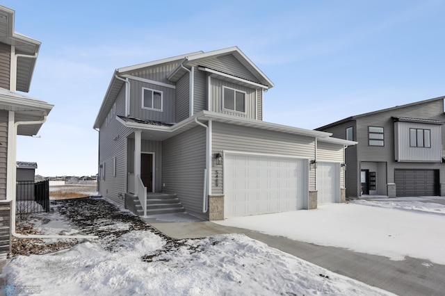 view of front of property featuring a garage