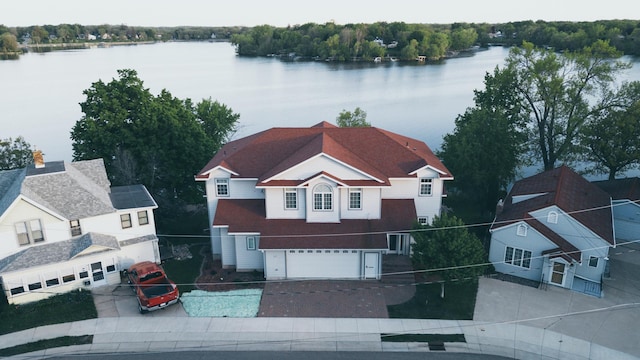 drone / aerial view featuring a water view