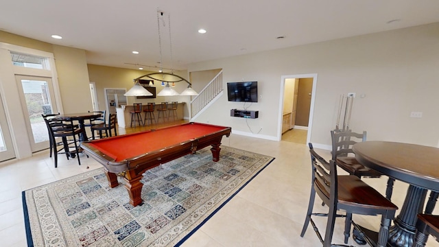 recreation room with light tile patterned floors and billiards