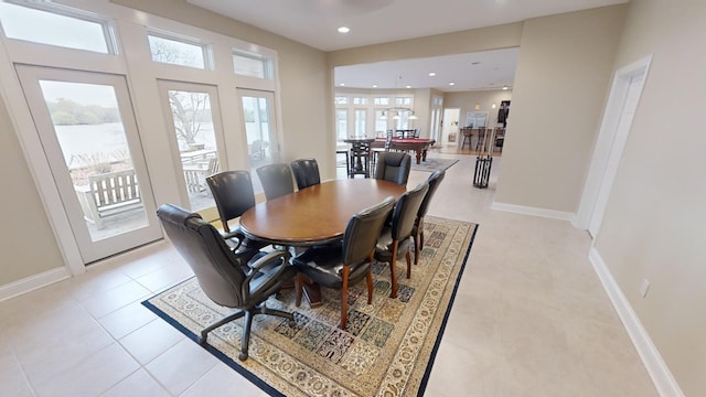 dining space with light tile patterned floors