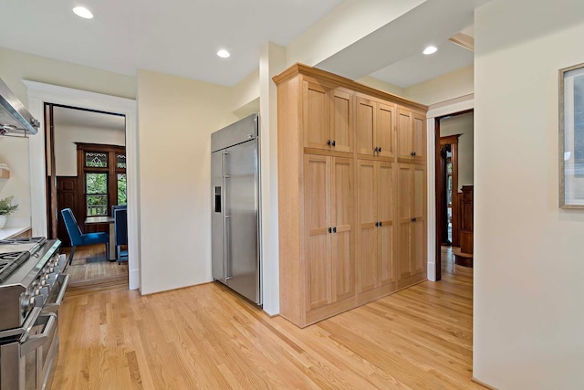 hallway featuring light hardwood / wood-style floors