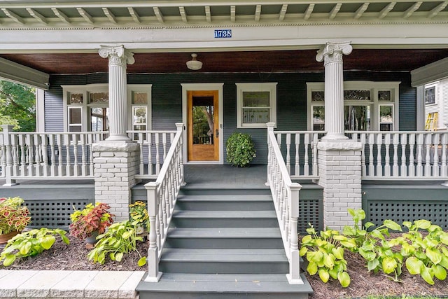 entrance to property with covered porch