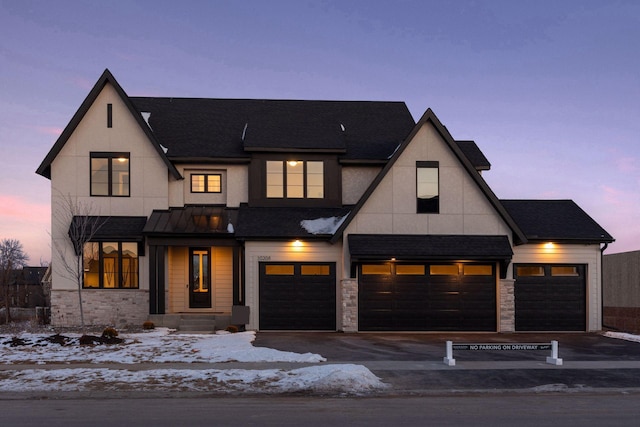 modern farmhouse style home with a garage